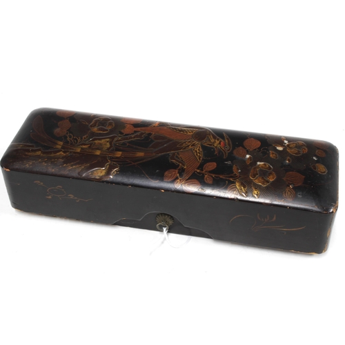 403 - Japanese black lacquer glove box, decorated with a bird and flowers, 27 x 6 x 9cm