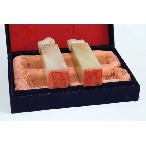 428 - Three Chinese hardstone chop seals with two porcelain jars, boxed