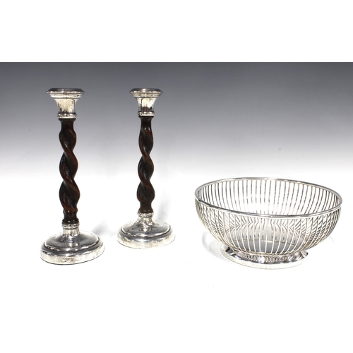 430 - A pair of silver mounted oak candlesticks, London 1969, 23cm high and a Viners silver plated bowl (3... 