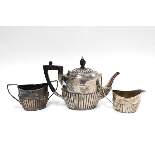 56 - An Edwardian silver Bachelors three piece teaset, George Wish & Co, Sheffield 1903, (3)