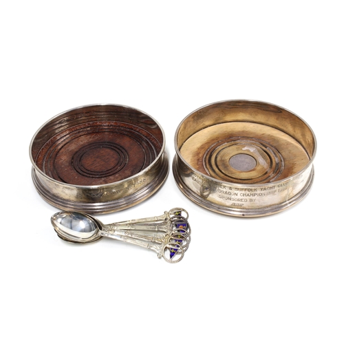 67 - Two silver wine coasters, with presentation inscriptions, and a set of six Epns and enamel teaspoons... 