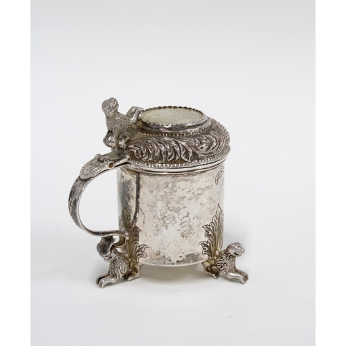 7 - Danish white metal inkwell, with an inset hinged lid and gilt interior, on lion feet, 7cm,