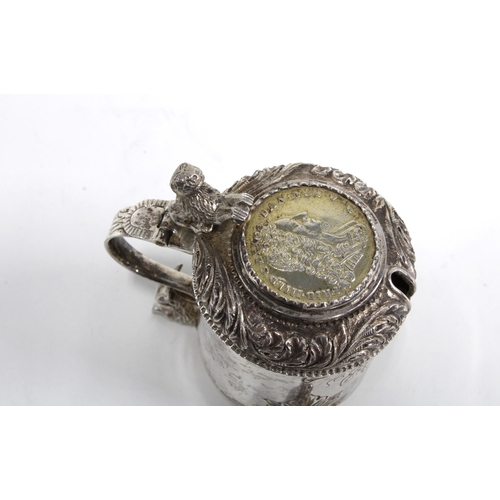 7 - Danish white metal inkwell, with an inset hinged lid and gilt interior, on lion feet, 7cm,