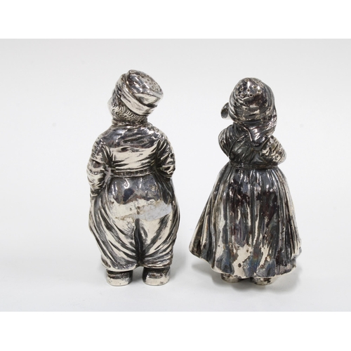 9 - 19th century German silver cruet set modelled as a Dutch girl and boy wearing clogs, Hanau marks,  9... 