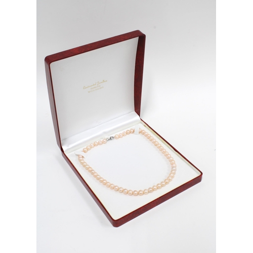 95 - Cultured pearl strand necklace with silver clasp, boxed