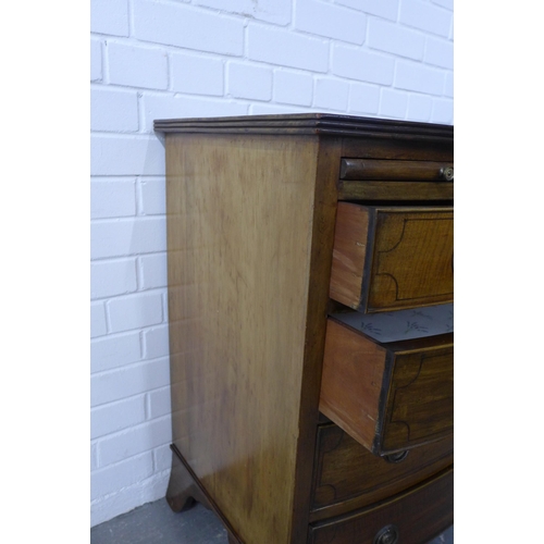 275 - Mahogany bow front chest of drawers with a pull out slide and four long drawers, on bracket feet, 85... 