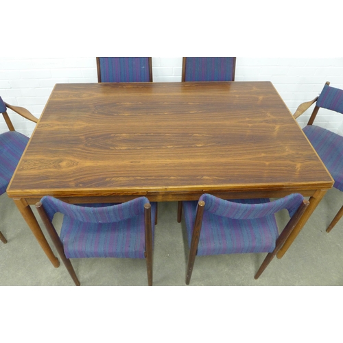 216 - Mid Century extending dining table with six chairs comprising three pairs of matched chairs with the... 