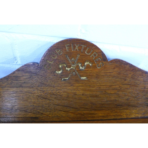 233 - Golf Interest: an oak 'Club Fixtures' wall shelf with four drawers, golf ball and thistle carving, 4... 