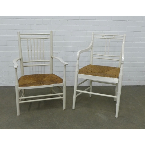 243 - Two white painted Sussex style armchairs with woven sets, 50 x 85 x 42cm, (2)