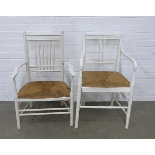 243 - Two white painted Sussex style armchairs with woven sets, 50 x 85 x 42cm, (2)