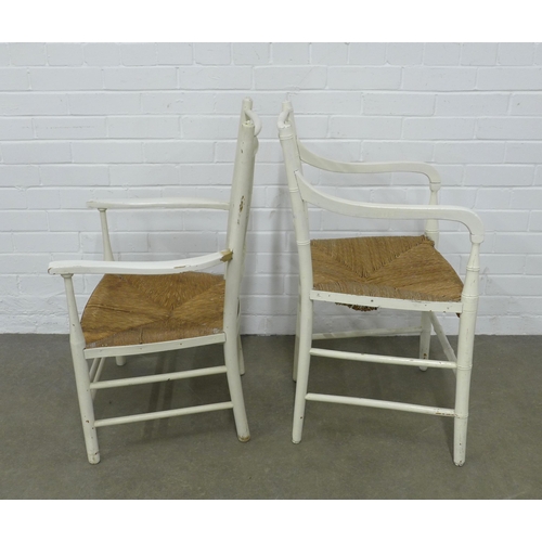 243 - Two white painted Sussex style armchairs with woven sets, 50 x 85 x 42cm, (2)