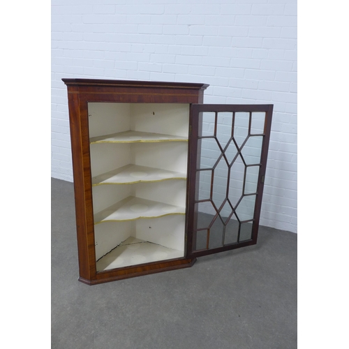 255 - Mahogany and string inlaid corner cupboard, white painted  & shelved interior with an astragal glaze... 