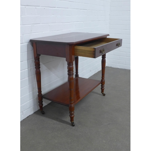 259 - Edwardian mahogany table, rectangular top with canted corners over a single frieze drawer, undertier... 