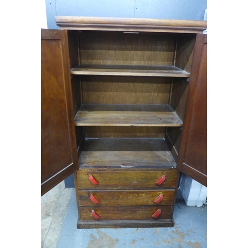 285 - An early 20th century stained pine cupboard, the doors with stencilled mackintosh rose motifs, 80 x ... 