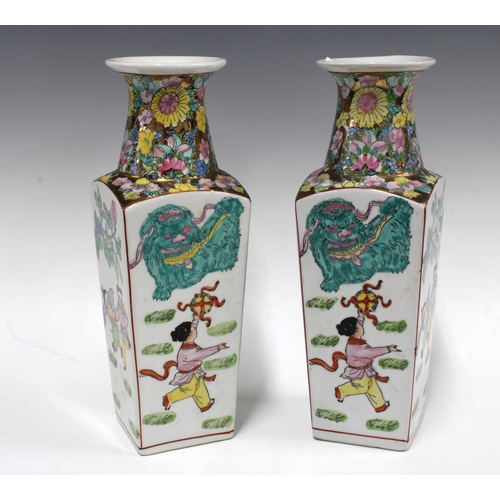 301 - Pair of Chinese vases showing children playing, 32cm (2)