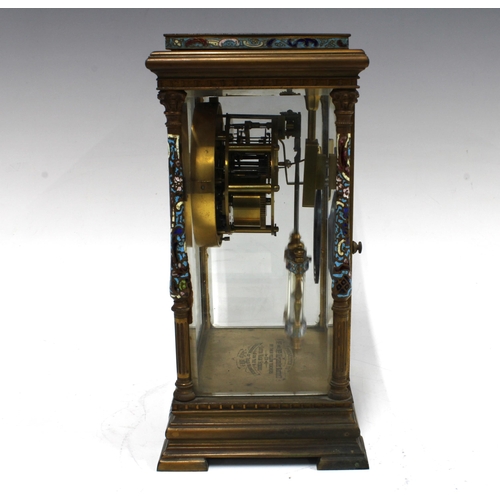 308 - French Brass and champleve enamel four glass panelled mantle clock, with presentation plaque for 190... 