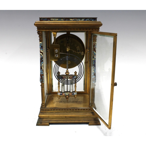 308 - French Brass and champleve enamel four glass panelled mantle clock, with presentation plaque for 190... 