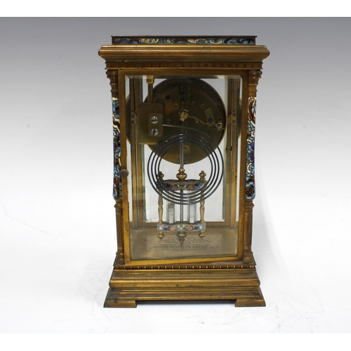 308 - French Brass and champleve enamel four glass panelled mantle clock, with presentation plaque for 190... 