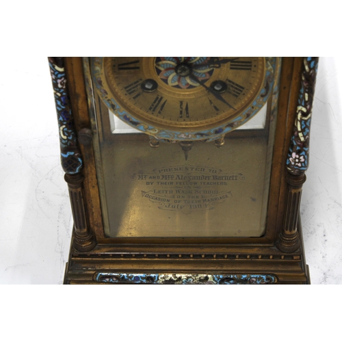 308 - French Brass and champleve enamel four glass panelled mantle clock, with presentation plaque for 190... 