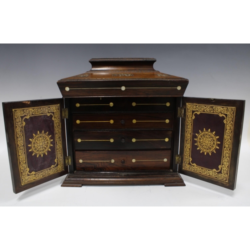 309 - William IV mother of pearl inlaid rosewood jewellery casket, with lift up sarcophagus top, four inte... 