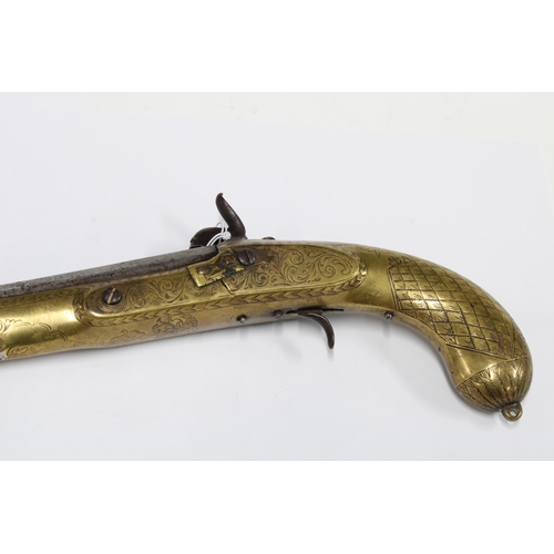 310 - A 19th century brass mounted percussion pistol, possibly Scottish, with foliate decoration, with oct... 