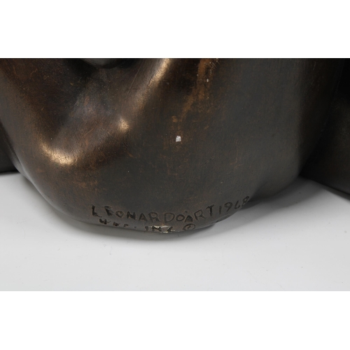 335 - Bronze patinated plaster sculpture of two people embracing, marked Leonardo Art 1968, 44 x 33cm (som... 