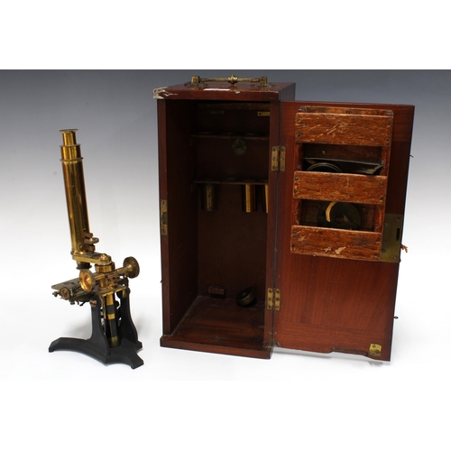 339 - A gilt lacquered and black enamelled monocular microscope , 37cm, in fitted wooden case, 19 x 43 x 2... 