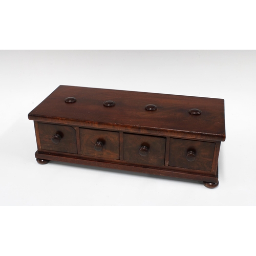 340 - Mahogany spice cabinet with four drawers, on bun feet, 36 x 11 x 15cm