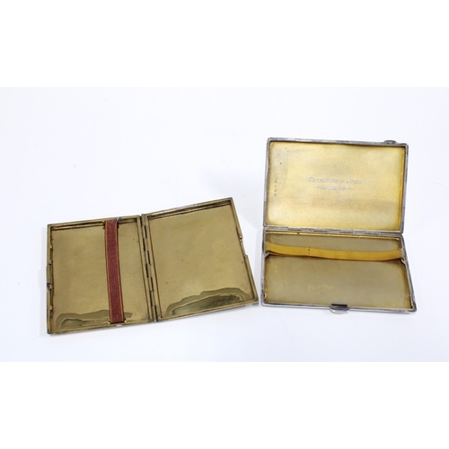 35 - George V silver cigarette case, Birmingham 1936 together with another in gilt metal (2)