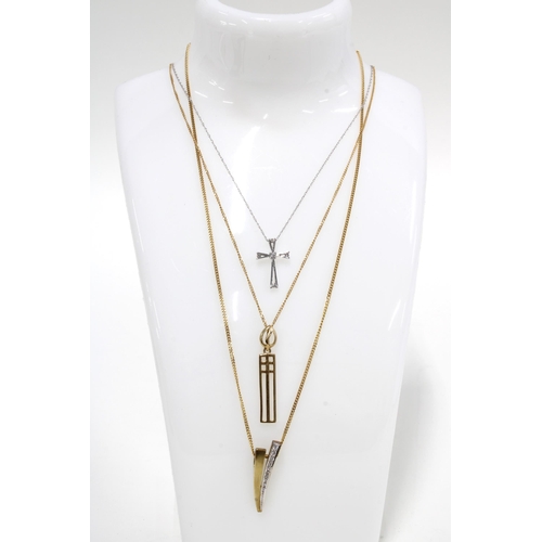 61 - Two 9ct gold pendant necklaces and a 9ct white gold diamond set crucifix (3)