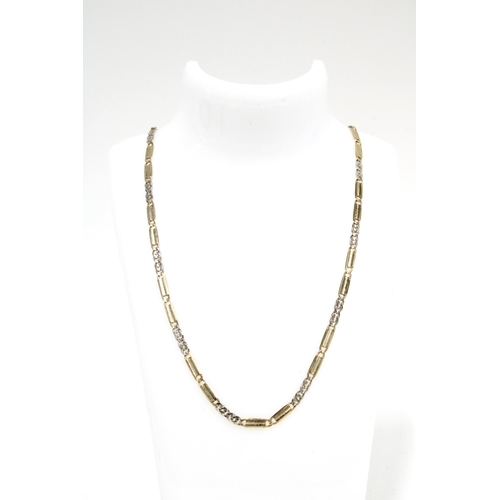 63 - 9ct gold fancy link necklace, stamped 375, in presentation box