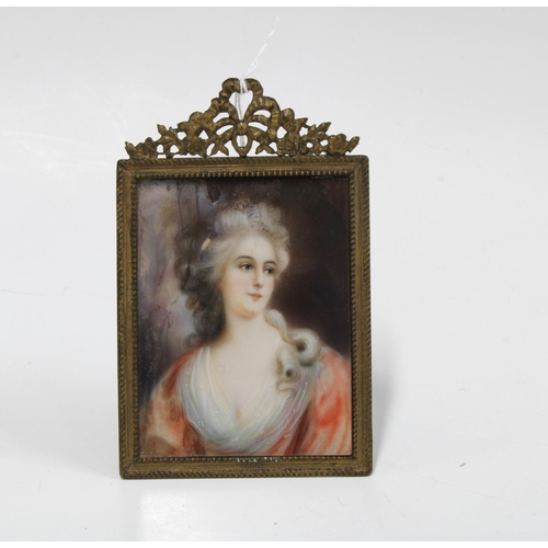 74 - 19th century portrait miniature on ivory of a woman, unsigned, in rectangular gilt metal frame, appr... 