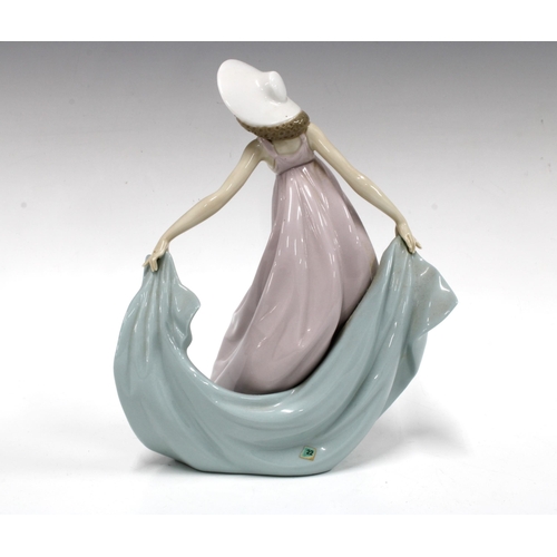 82 - Lladro Porcelain Figurine, Spring Dance (Tela Al Viento Azul), model no 5663, designed by Jose Puche... 