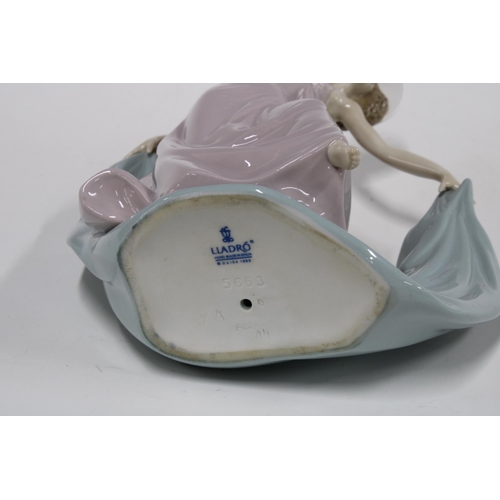 82 - Lladro Porcelain Figurine, Spring Dance (Tela Al Viento Azul), model no 5663, designed by Jose Puche... 