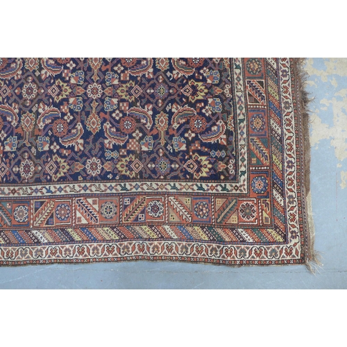 220 - Persian rug, blue foliate field,  300 x 141cm