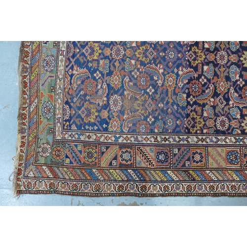 220 - Persian rug, blue foliate field,  300 x 141cm