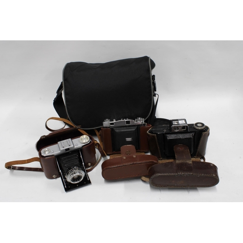 359 - Three vintage folding cameras to include Zeiss in a camera bag (3)