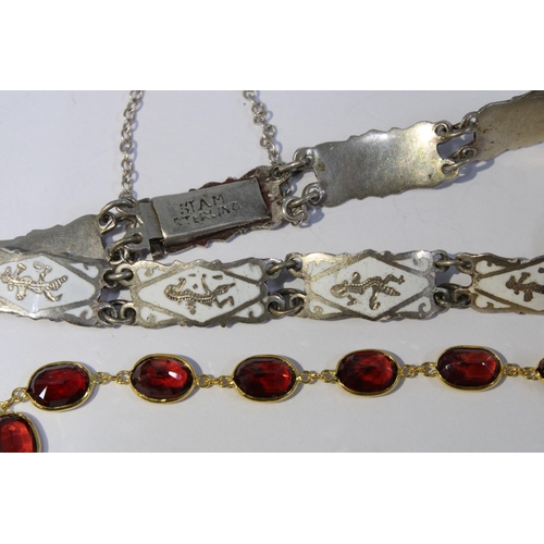 22 - Garnet bracelet, stamped 750 and a Siam Sterling and enamel bralet (2)