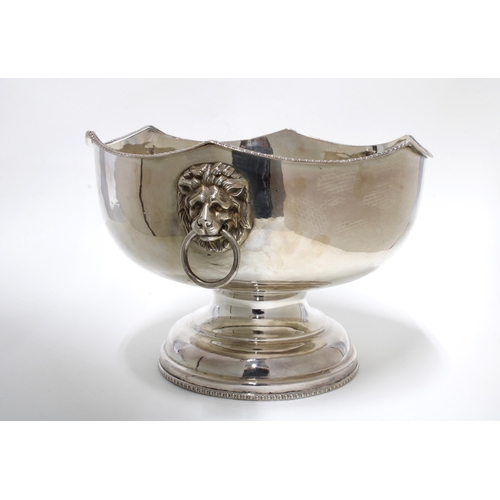 30 - Georgian toddy ladle with a coin insert bowl, an Epns punch bowl with lion mask handles, 25cm diamet... 