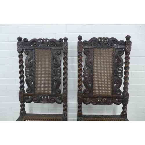 349 - Two Charles II style walnut chairs, carved with scroll leaves and crowns, barley twist supports, and... 