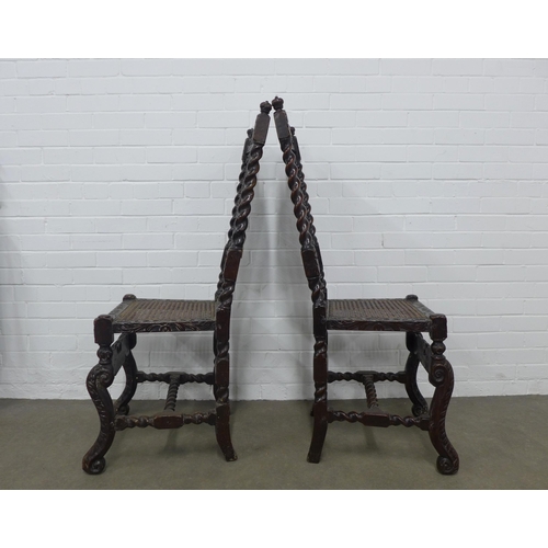 349 - Two Charles II style walnut chairs, carved with scroll leaves and crowns, barley twist supports, and... 