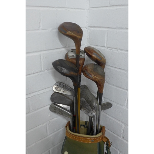 358 - Vintage gold clubs and golf bag