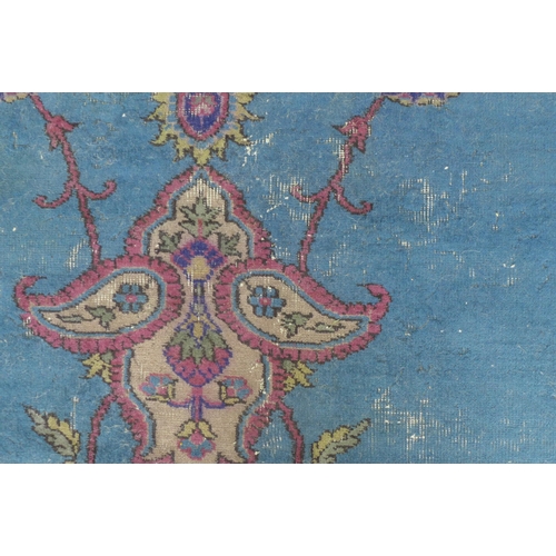 360 - Late 19th / early 20th century Country House  Persian carpet, with worn blue field and central folia... 