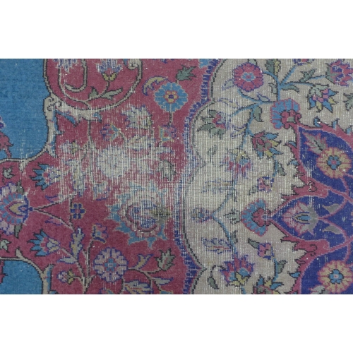 360 - Late 19th / early 20th century Country House  Persian carpet, with worn blue field and central folia... 