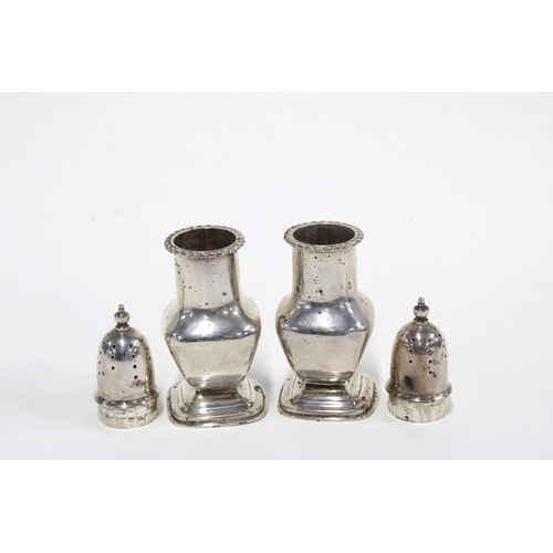 44 - A pair of novelty silver castor pepper pots, Birmingham 1915, 10cm (2)