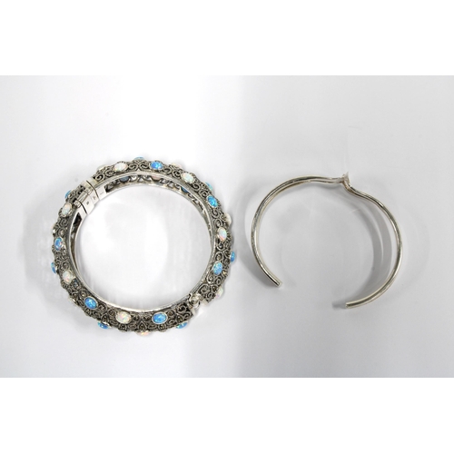 9 - Luke Stockley of London silver gemset bracelet and a Modernist silver cuff, stamped 925 (2)