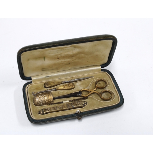 43 - Early 20th century gilt metal sewing kit, with a silver gilt thimble, Birmingham 1901, in original f... 