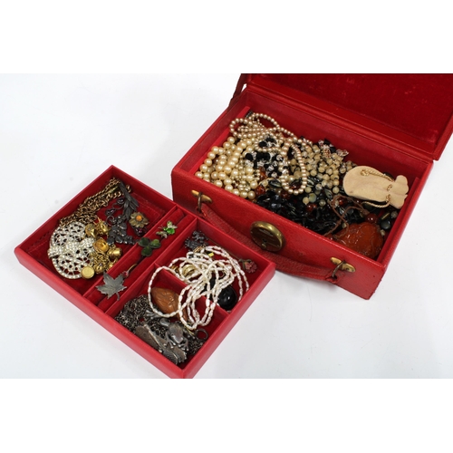 49 - Red leather jewellery case with a collection of vintage costume jewellery, etc