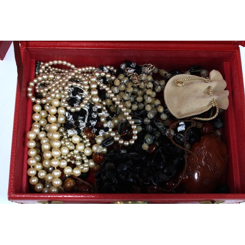 49 - Red leather jewellery case with a collection of vintage costume jewellery, etc