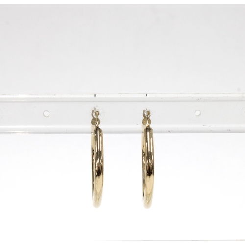 6 - A pair of 9ct gold hoop earrings, stamped 375